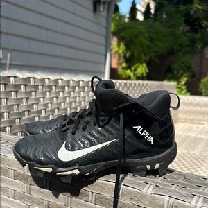Nike Alpha Black and White Sports Cleats